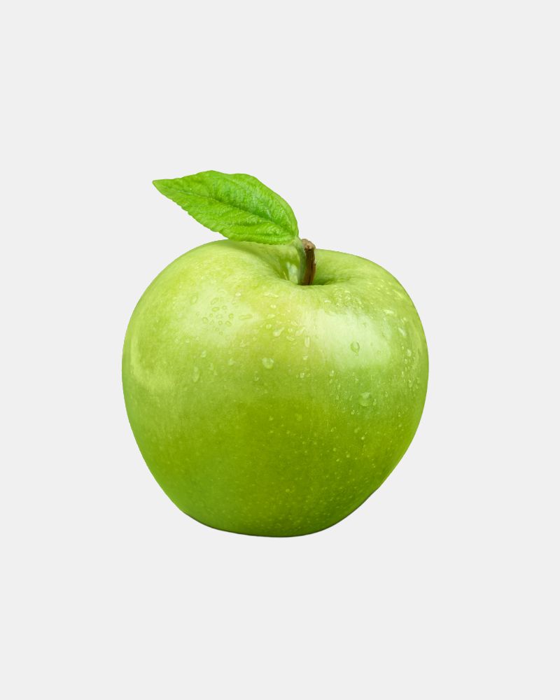 Ein grüner Apfel mit einem grünen Blatt am Stil.