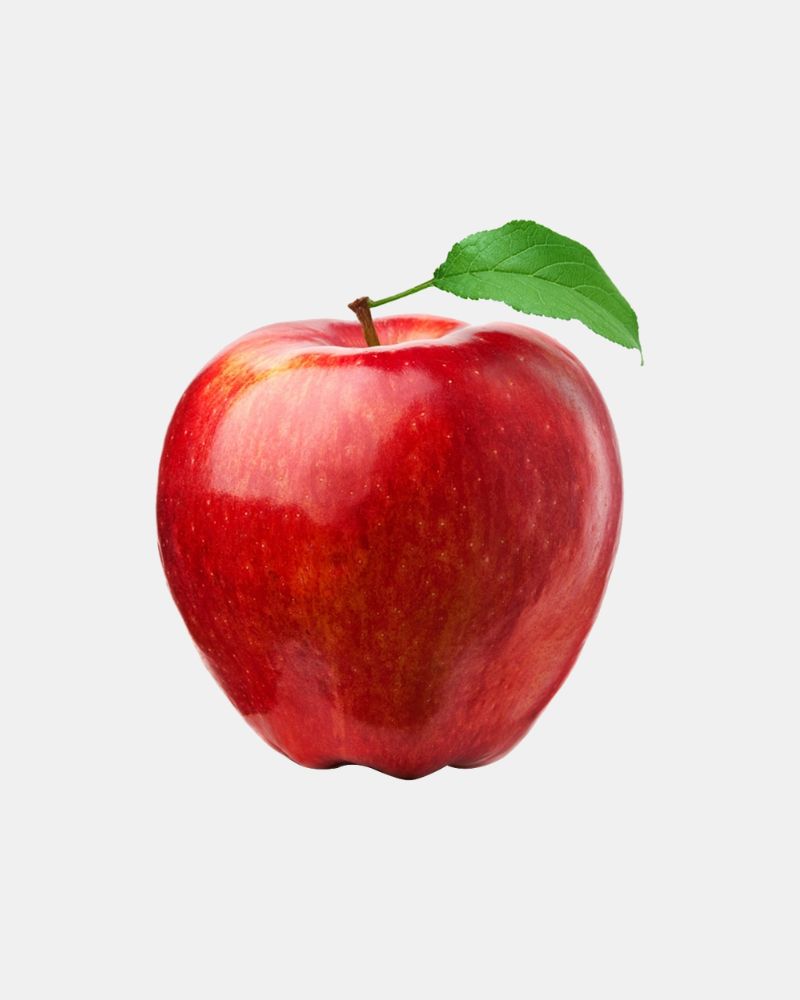 Ein roter Apfel mit einem grünen Blatt am Stil